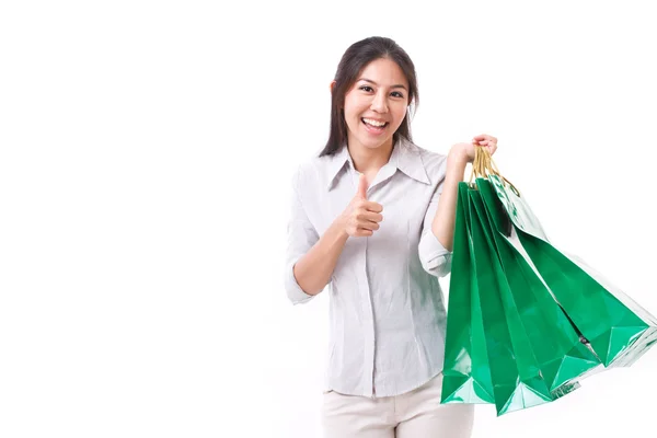 Mulher de compras mostrando polegar para cima gesto — Fotografia de Stock