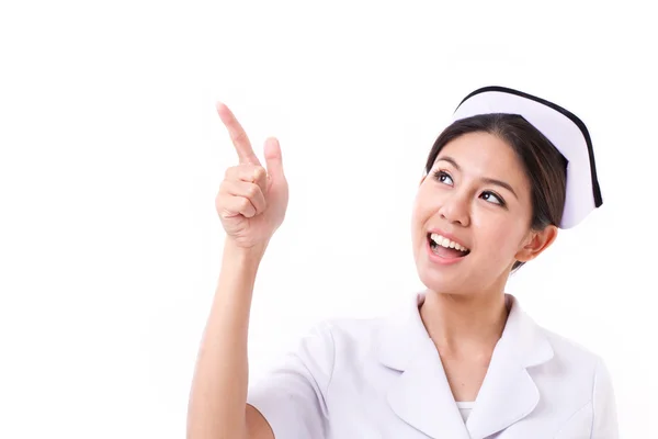 Nurse pointing up, raising one finger — Stock Photo, Image