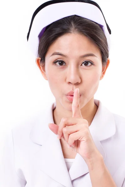 Enfermera pidiendo silencio con gesto de mano — Foto de Stock