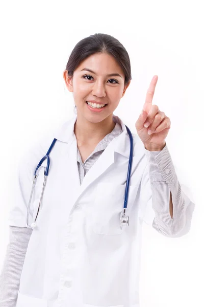 Female doctor pointing one finger up — Stock Photo, Image