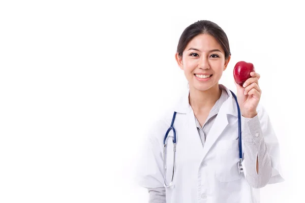 Γυναίκα γιατρός με χέρι που κρατά το κόκκινο μήλο, έννοια της υγιή fo — Φωτογραφία Αρχείου