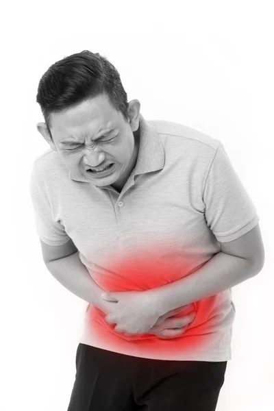 Hombre asiático que sufre de dolor de estómago, estreñimiento, indigestión — Foto de Stock