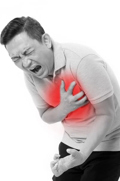 Sick man suffering from heart attack Stock Photo