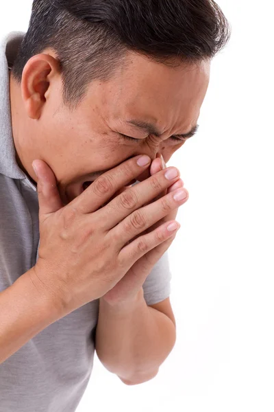 Hombre enfermo estornudando, estudio blanco aislado — Foto de Stock
