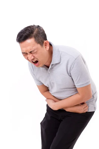 Asiático homem sofrendo de dor de estômago, constipação, indigestão , — Fotografia de Stock