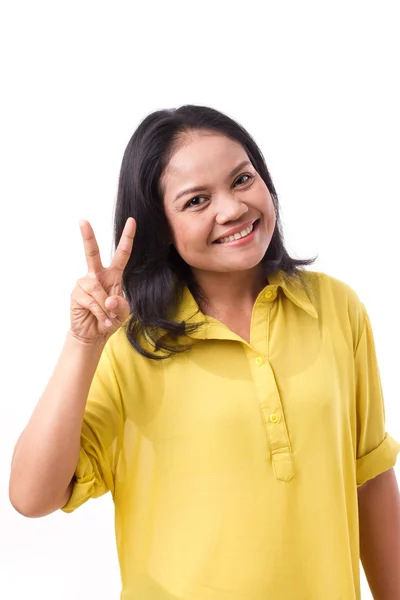 Middle aged woman pointing up 2 fingers — Stock Photo, Image