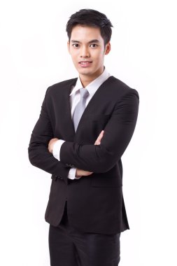 Kendine güvenen işadamı kollarını geçerken