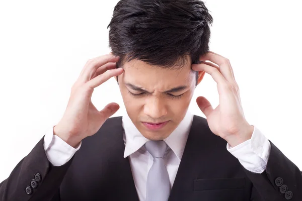 Empresário sofrendo de dor de cabeça — Fotografia de Stock