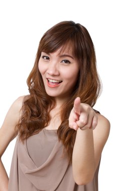 happy, positive, bright, beautiful, asian woman pointing at you.