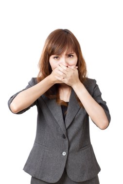 ağzını sıkıca kapsayan iş kadını