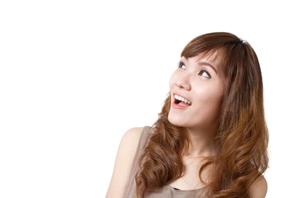 Glimlachend, gelukkig, positief, zorgeloos vrouw gezicht kijken naar lege ruimte — Stockfoto