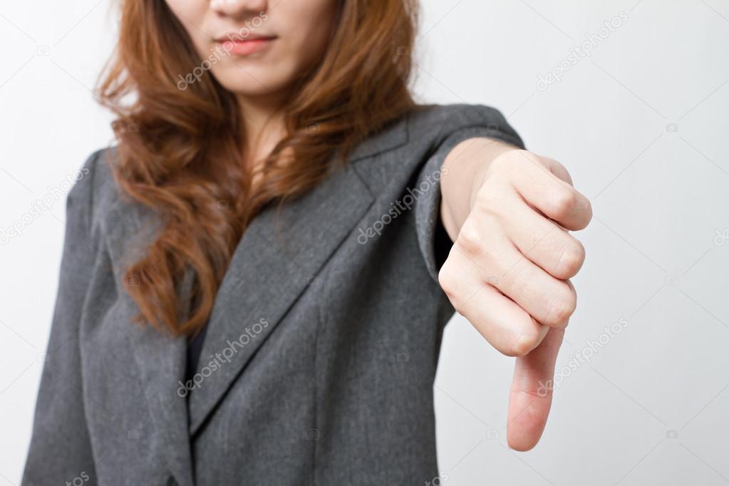 thumb down hand gesture of business woman