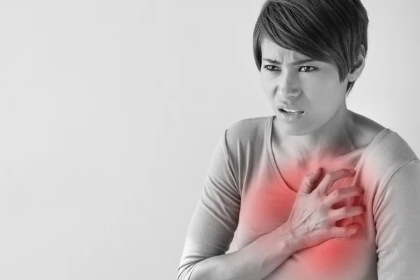 Sick woman with sudden heart attack symptom — Stock Photo, Image