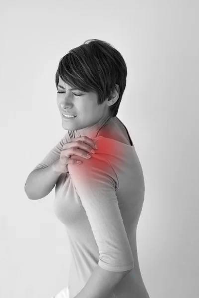 Woman with shoulder pain or stiffness — Stock Photo, Image