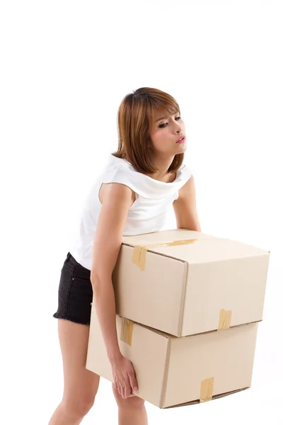 Cansancio, mujer molesta llevando caja pesada con emoción negativa — Foto de Stock