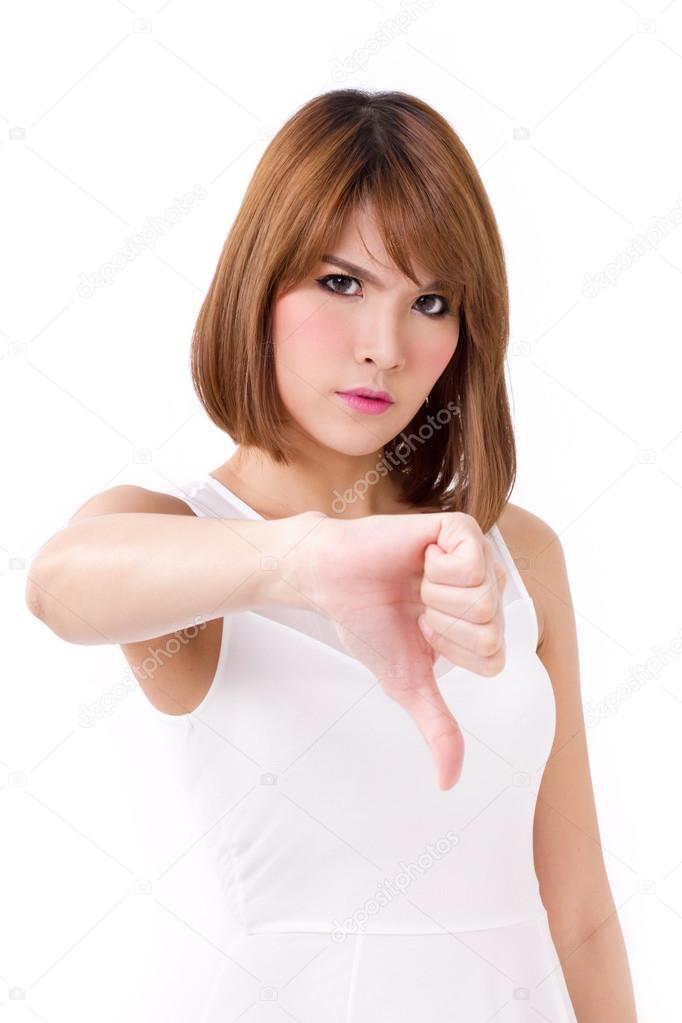 frustrated, upset, displeased woman giving thumb down gesture