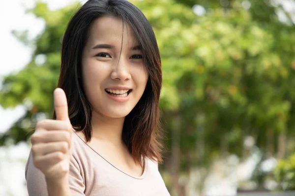 Successful Girl Pointing Thumb Portrait Cheerful Smiling Woman Pointing Approving — Stock Photo, Image