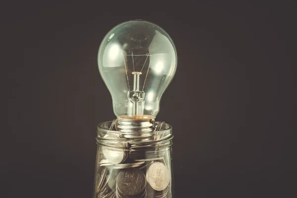 Lamp and money with filter effect retro vintage style — Stock Photo, Image