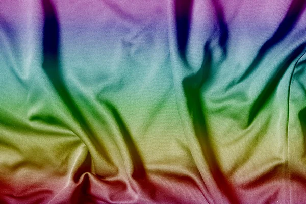 Regenboog stof doek achtergrondstructuur — Stockfoto