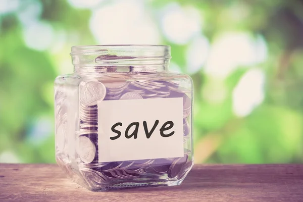 Save money for investment concept money in the glass with filter — Stock Photo, Image