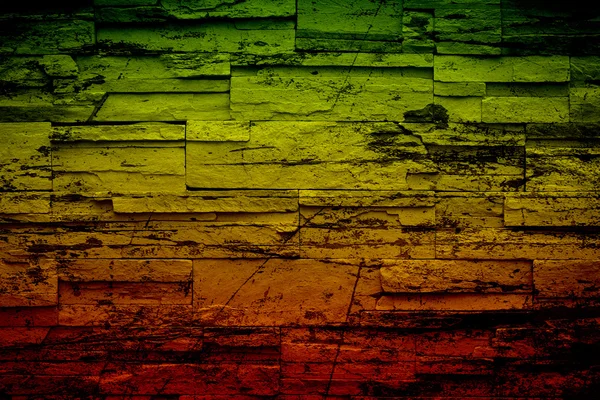 Grunge háttér reggae színű zöld, sárga, piros — Stock Fotó