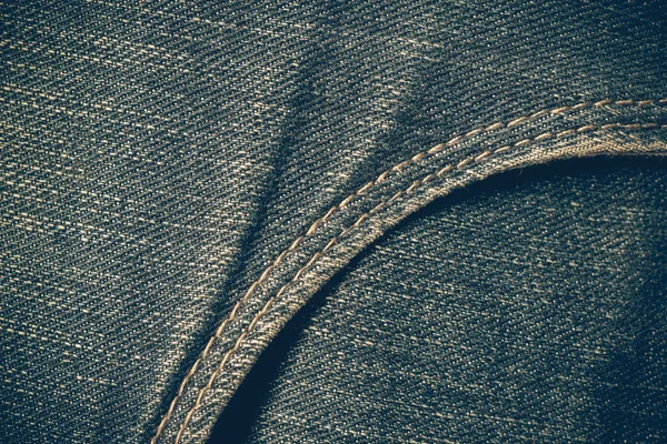 Texture di sfondo blu jeans con effetto filtro vintag retrò — Foto Stock