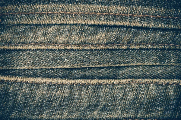 Texture di sfondo blu jeans con effetto filtro vintag retrò — Foto Stock