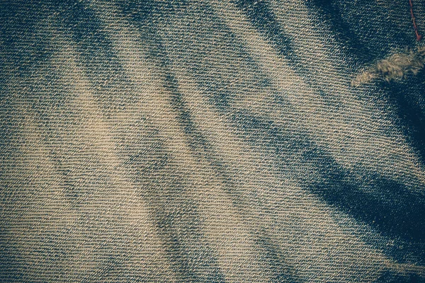 质地的蓝色牛仔裤背景与滤波效果复古 vintag — 图库照片