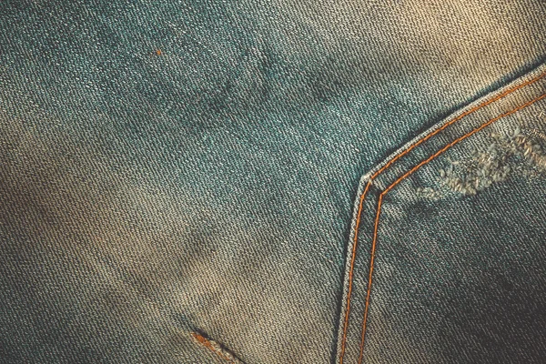 质地的蓝色牛仔裤背景与滤波效果复古 vintag — 图库照片