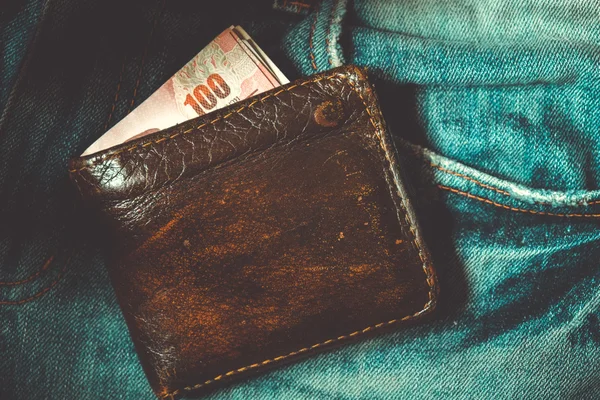 Wallet and jean with filter effect retro vintage style — Stock Photo, Image