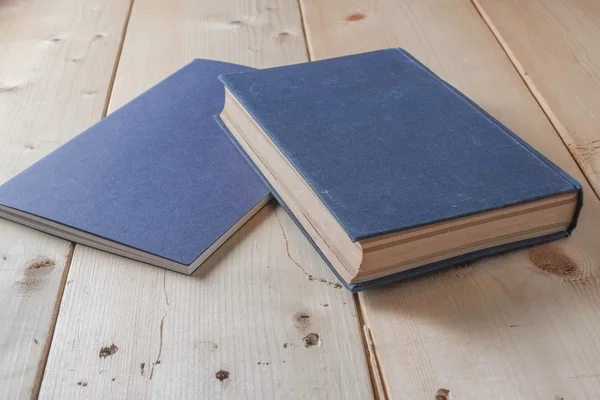 Recycled paper book on wooden background