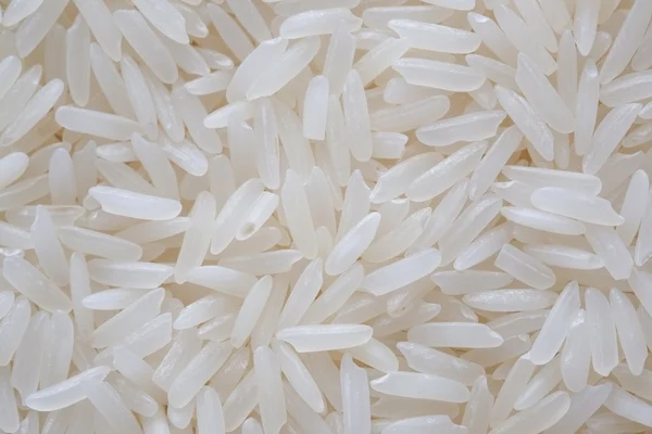 Белая длинная текстура риса — стоковое фото