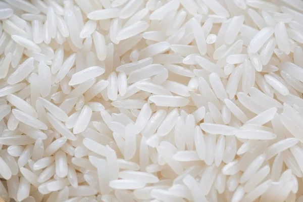Белая длинная текстура риса — стоковое фото