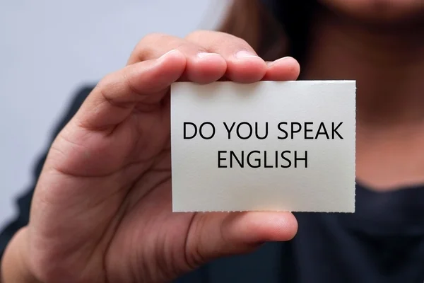 Message on the card shown by a business woman — Stock Photo, Image