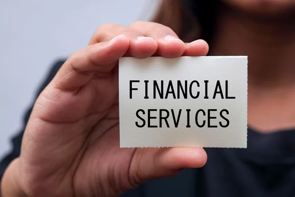 Message on the card shown by a business woman — Stock Photo, Image