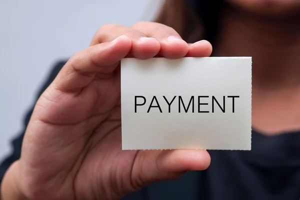 Message on the card shown by a business woman — Stock Photo, Image