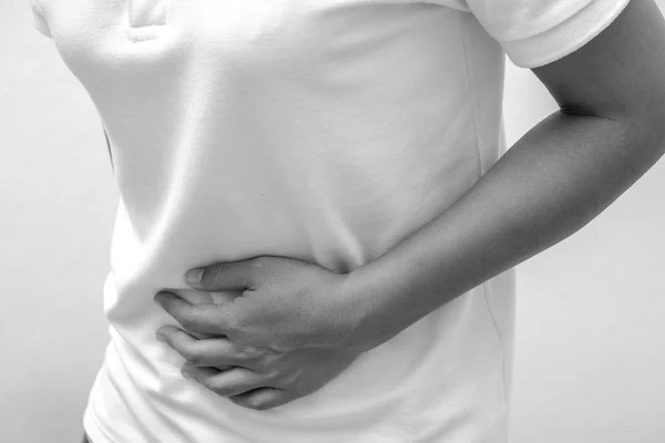 Blabk and white Woman Suffering From Stomach Ache — Stock Photo, Image