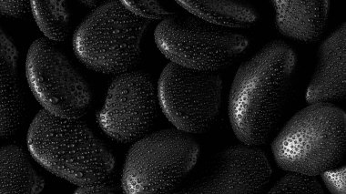 Kara Taşlar. Kaya arka planı ve su damlası.