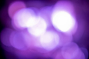 Mavi donanma arka planında, Bokeh 'te gümüş yılbaşı deseni soyut ışık parıldayan yıldızlar parıldıyor. simli klasik ışık arkaplanı