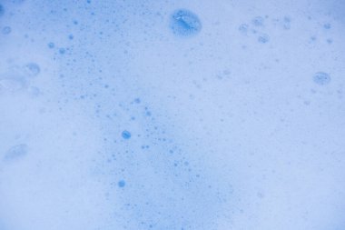 Soyut arka plan beyaz sabunlu köpük dokusu. Köpüklü şampuan köpüğü.