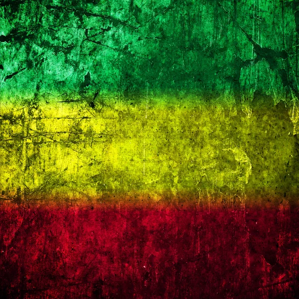 Bandera rasta roja, amarilla y verde en la pared de hormigón — Foto de Stock