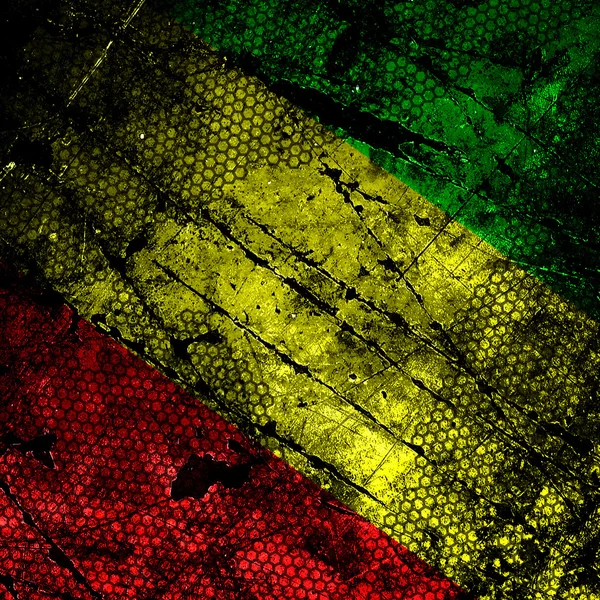 Vermelho, amarelo, bandeira rasta verde na parede de concreto texturizado grunge — Fotografia de Stock