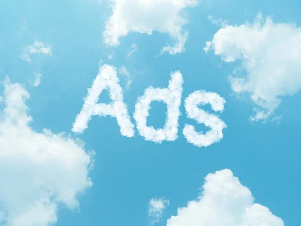 Cloud words with design on blue sky background — Stock Photo, Image