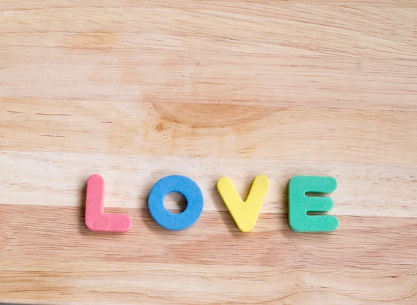 Amor sobre fondo de madera, fondo de San Valentín —  Fotos de Stock