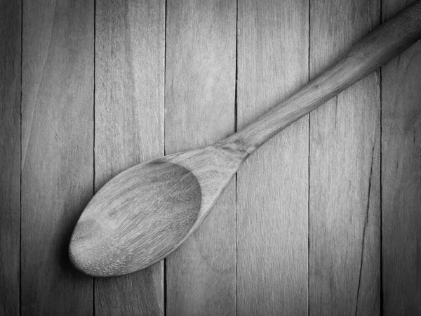 black and white Spoon on a wood table