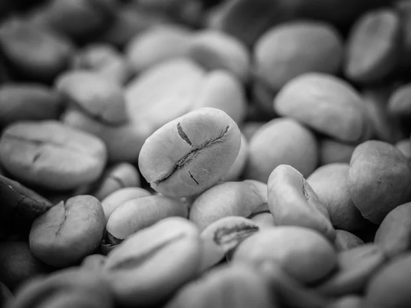Black and white coffee beans — Stock Photo, Image