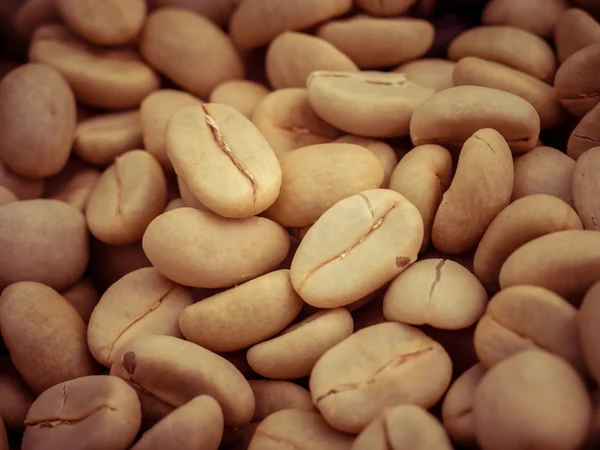 Green coffee beans macro with filter effect retro vintage style — Stock Photo, Image