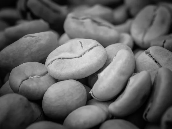 Black and white coffee beans — Stock Photo, Image