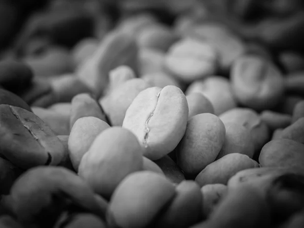 Black and white coffee beans — Stock Photo, Image