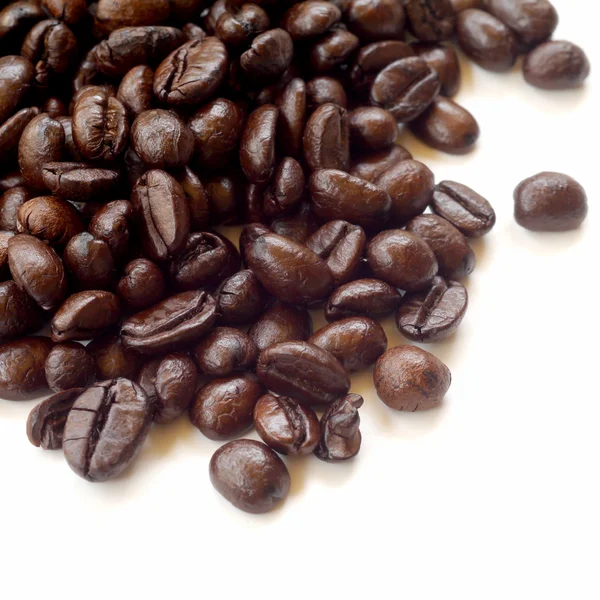 Brown coffee beans isolated on white background — Stock Photo, Image